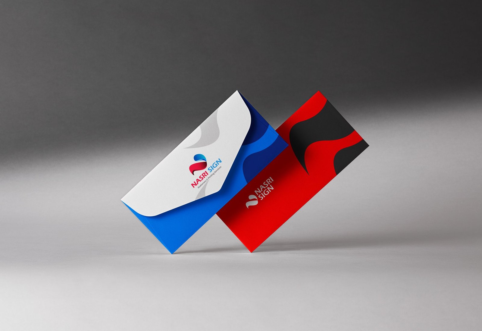 NASRI SIGN branded stationery and envelope mockup