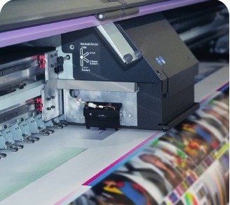 Large format printer producing branded materials